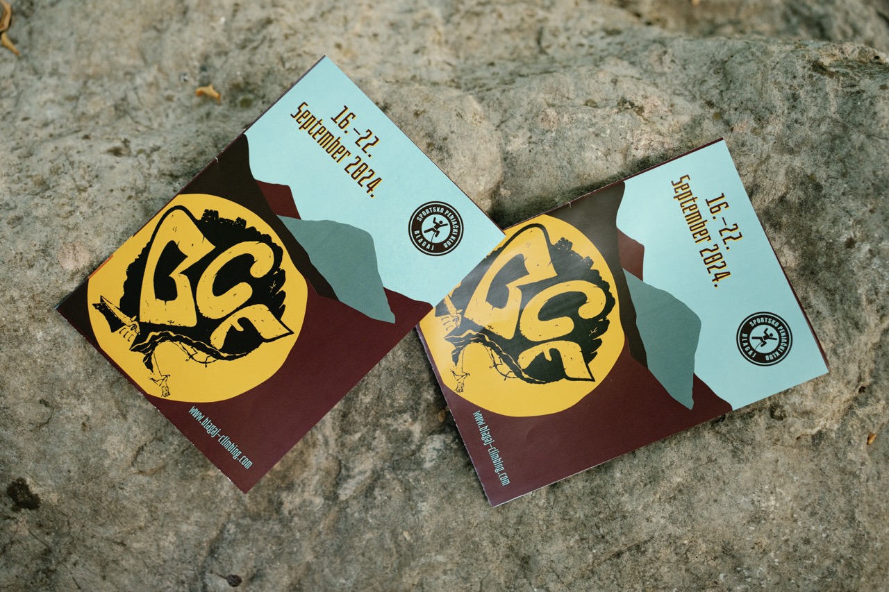 two climbing event flyers with september 16-22 2024 dates placed on rocky surface